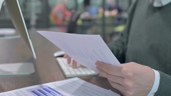 Close Up Shoot of Man Hand Checking the Documents