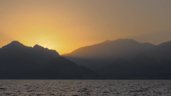 Mountains By the Sea in the Evening Sun