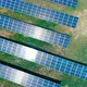 Aerial View. Flying Over The Solar Power Plant With Sun. Solar Panels And Sun. - VideoHive Item for Sale