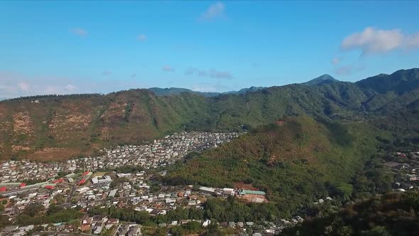 Aerial view of homes in valley surrounded by mountains on Oahu Hawaii