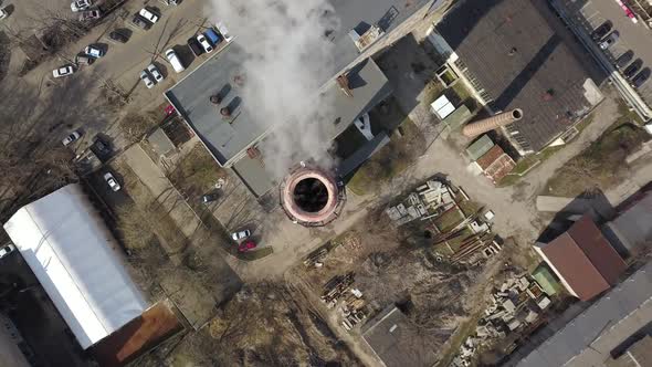 Aerial Top Down View on Power Plant Pipe with White Smoke in Winter