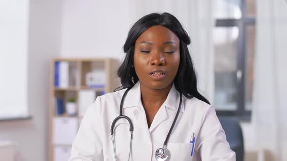 African American Doctor Having Online Consultation