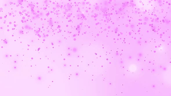 Animation of multiple glowing pink spots of light moving in hypnotic motion on pink background alt