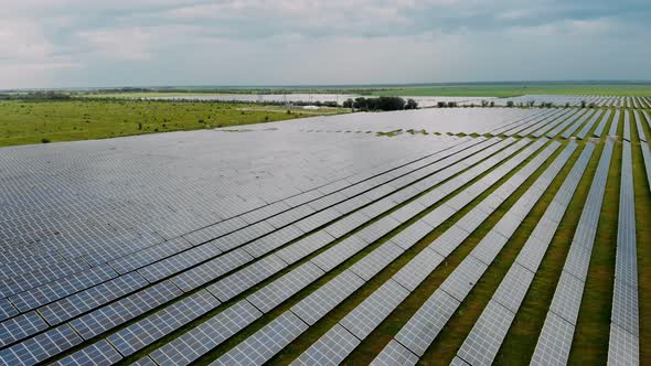 Ecology solar power station panels in the fields. Electrical innovation nature environment.