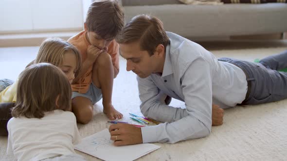 Dad Teaching Little Kids to Draw