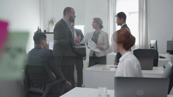 Chief Critisize Young Woman at the Office