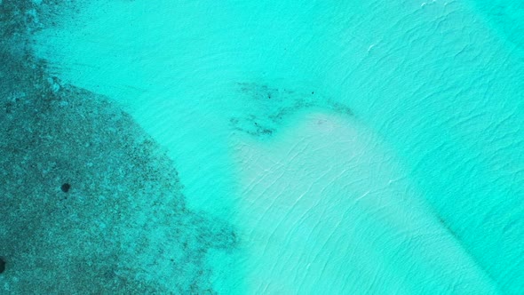 Aerial above panorama of beautiful resort beach lifestyle by blue sea and white sand background of a