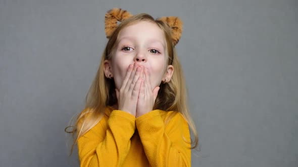 Cute Surprised Blond Girl with Tiger Ears