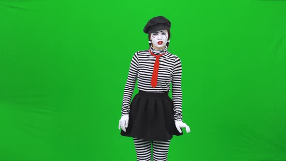 Mime Girl Is Trying To Make Out Something. Chroma Key