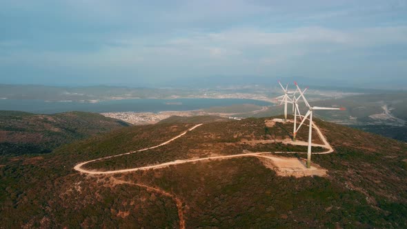 Drone Flies Over a Windmill Park