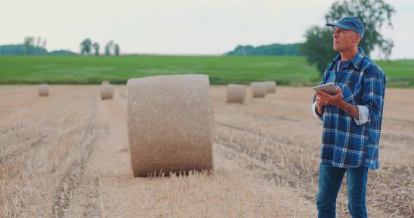 Agriculture Farmer Examining Field Modern Farming