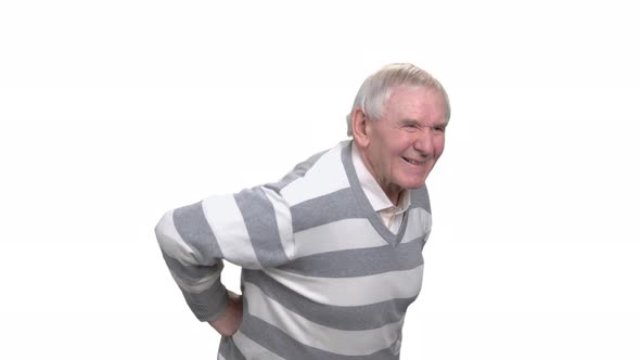 Senior Man Suffering From Back Pain.