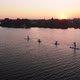 Aerial Drone View of People Paddling on a Sup Board in Kherson Ukraine Sunrise River - VideoHive Item for Sale