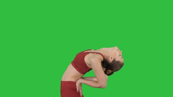 Young attractive woman practicing yoga stretching in Ustrasana