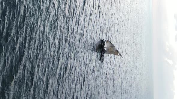 Tanzania Vertical Video  Boat Boats in the Ocean Near the Coast of Zanzibar Aerial View