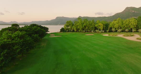 Aerial View of Golf Course with Putting Green Grass and Trees