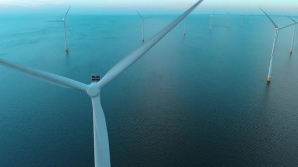 Windmill Park in the Ocean Drone Aerial View of Windmill Turbines Generating Green Energy Electric