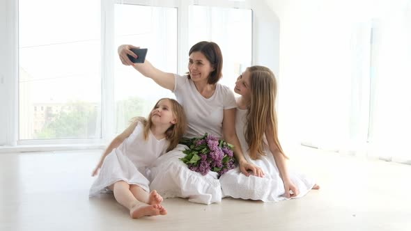 Mother with Daughters in Studio