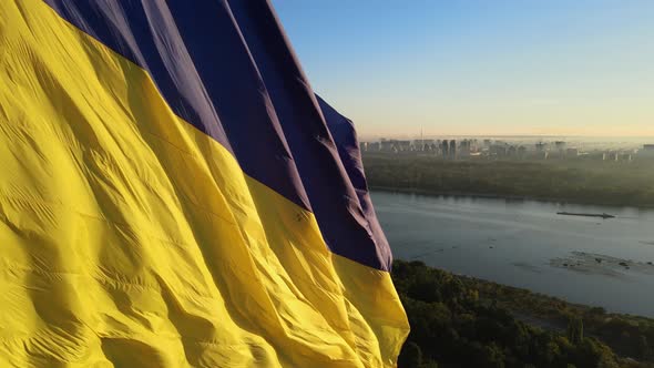 Ukrainian Flag in the Morning at Dawn. Aerial. Kyiv. Ukraine