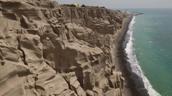 Weird and stunning rock formations on Vlychada Beach (Santorini Greece by drone)