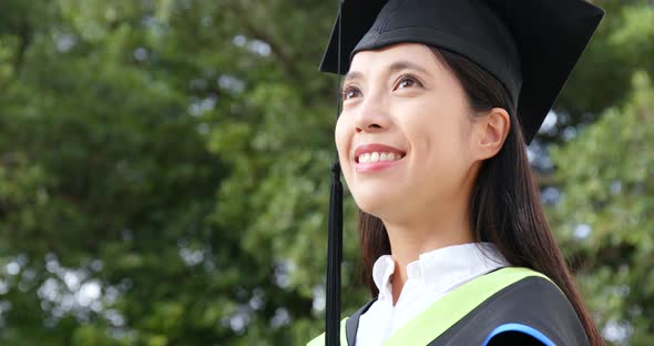 Young Woman Get Graduation in University Campus