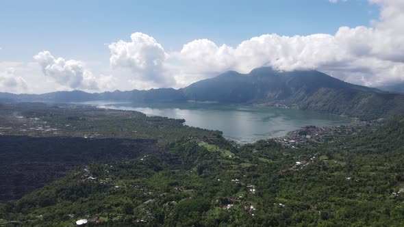 Aerial view of Batur lake Kintamani Bali with cloud in the background