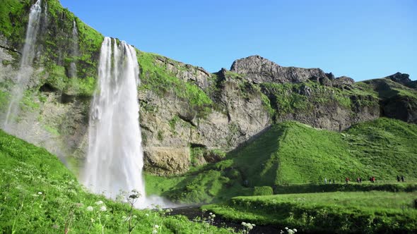 Seljalandsfoss Waterfalls and Mountains in Summer Season Iceland Slow Motion