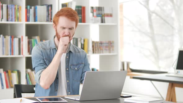 Sick Casual Redhead Man Coughing at Work