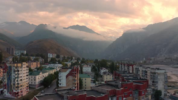 Cityscape with Numerous Buildings on Streets of Tyrnyauz Elbrus City Sunset