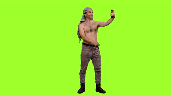 Male Tourist Taking Selfie on Green Background, Chroma Key