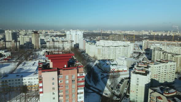 City quarters. Multi-story houses. Winter cityscape.