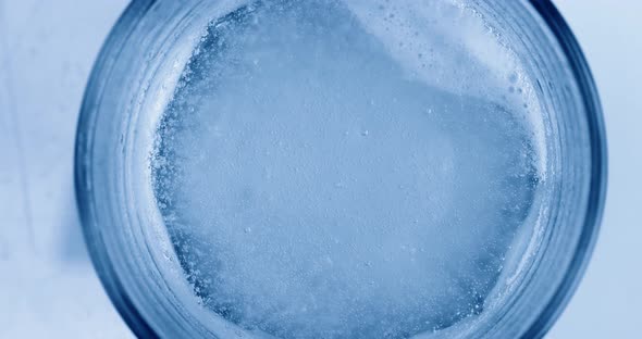 Oxygen Bubbles in Water on a Blue Abstract Background