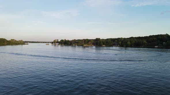 Boat sailing at the lake during the afternoon