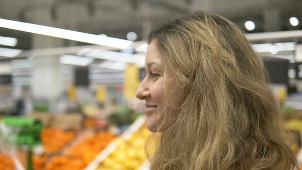 Girl Takes Off Mask in Supermarket Close-up, Stop Covid-19