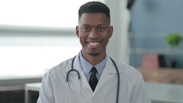 Portrait of African Doctor Smiling at Camera