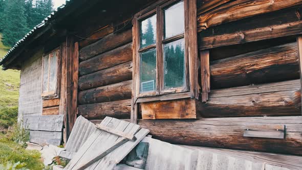 Tradition Old Wooden House on Hill in the Carpathian Mountains Near Green Valley