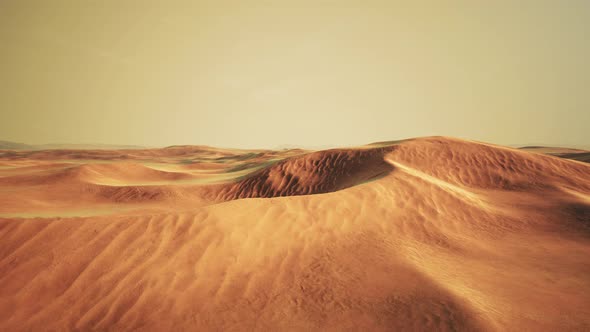 Sunset Over the Sand Dunes in the Desert