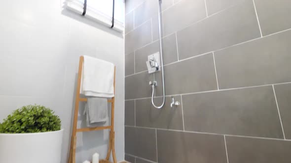 Stylish Grey Tiles Bathroom With Shower Head