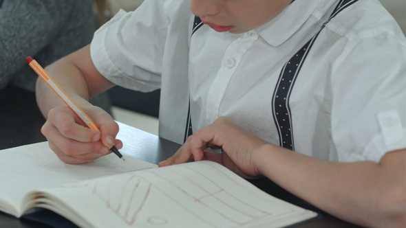 Boy Hands Doing Homework