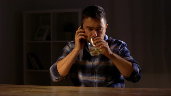 Man Drinking Whiskey and Calling on Smartphone 51