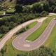 Aerial View of Cars Driving on Winding Serpentine Road, Switzerland - VideoHive Item for Sale