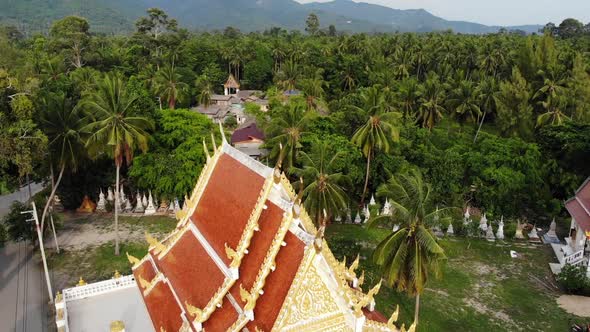 Classic Buddhist Temple Between Forest, From Above Drone View Buddhist Monastery Between Green Trees