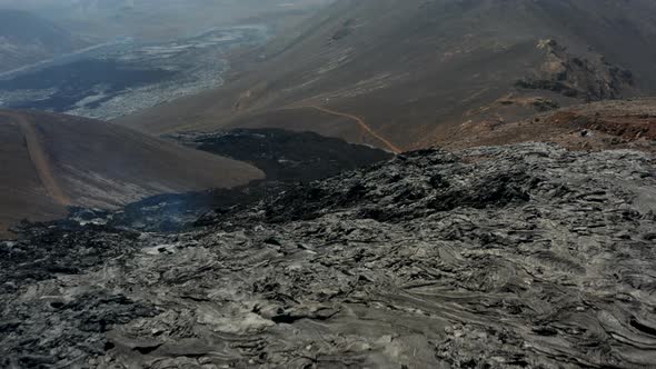 Fly Above Cooling Lava Stream Contouring Terrain