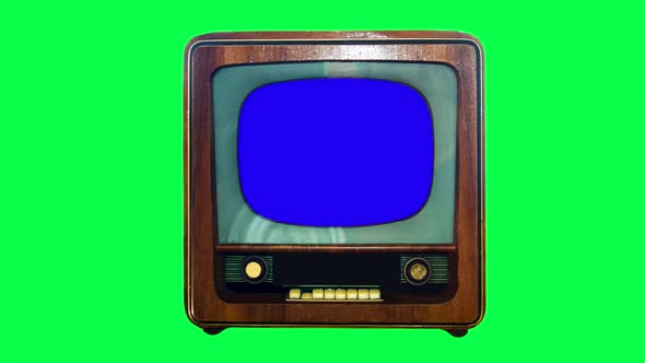 Chroma Key Retro Tv Set With A Blue Display For Composition On A Green Background.