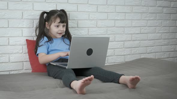 Little girl with notebook. 