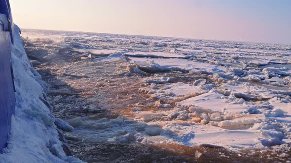 Ship Breaking Through Ice Ocean