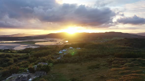 Flying Into the Sunrise Over Ballyiriston in County Donegal - Ireland.