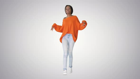 African American Girl Dancing Walking on Gradient Background