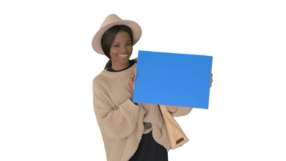 Attractive young african american female showing and pointing