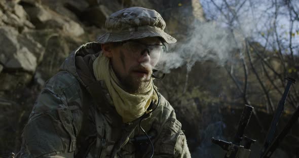 Soldier Taking a Break and Smoking